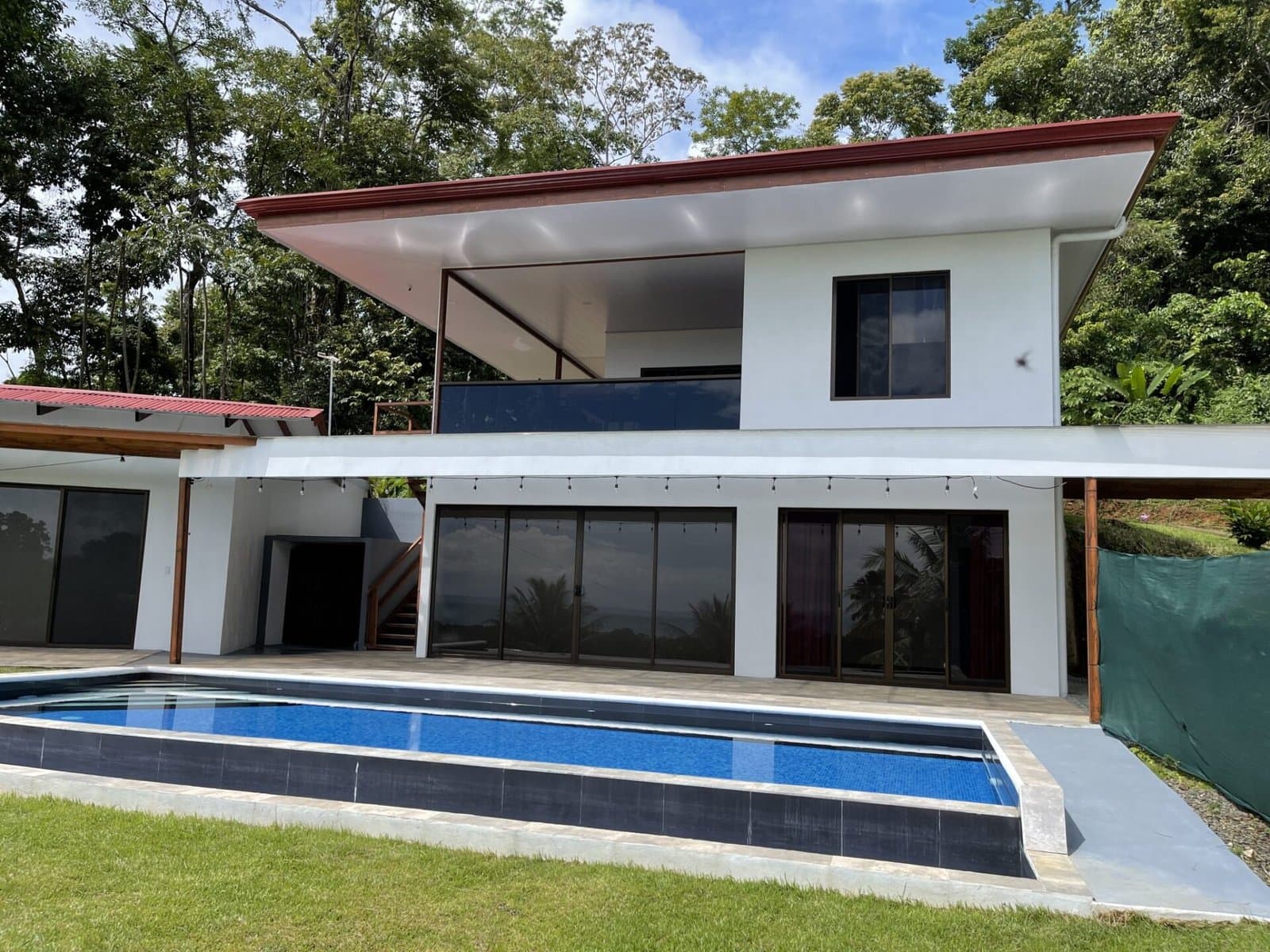 1.24 ACRES 4 Bedroom Ocean View Home With Pool In gated Community With Great Access! photo 2