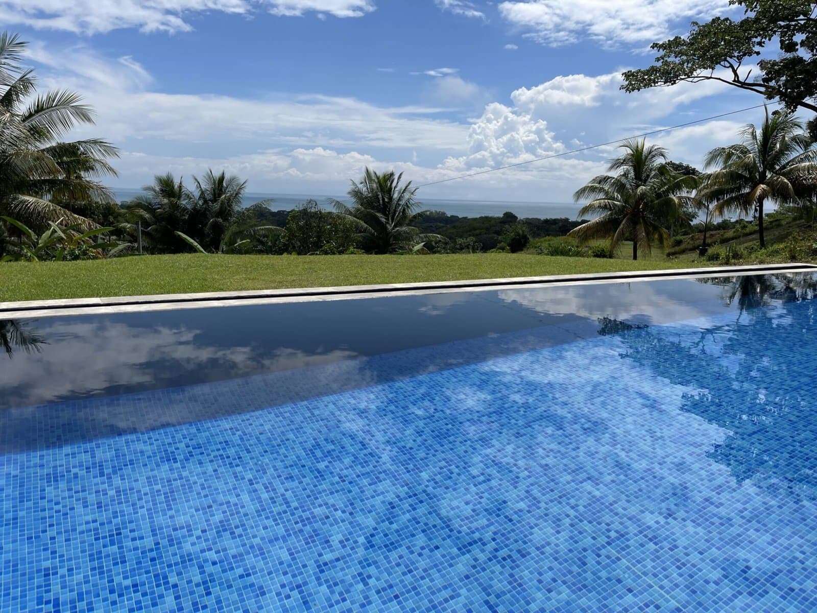 1.24 ACRES 4 Bedroom Ocean View Home With Pool In gated Community With Great Access! photo 3