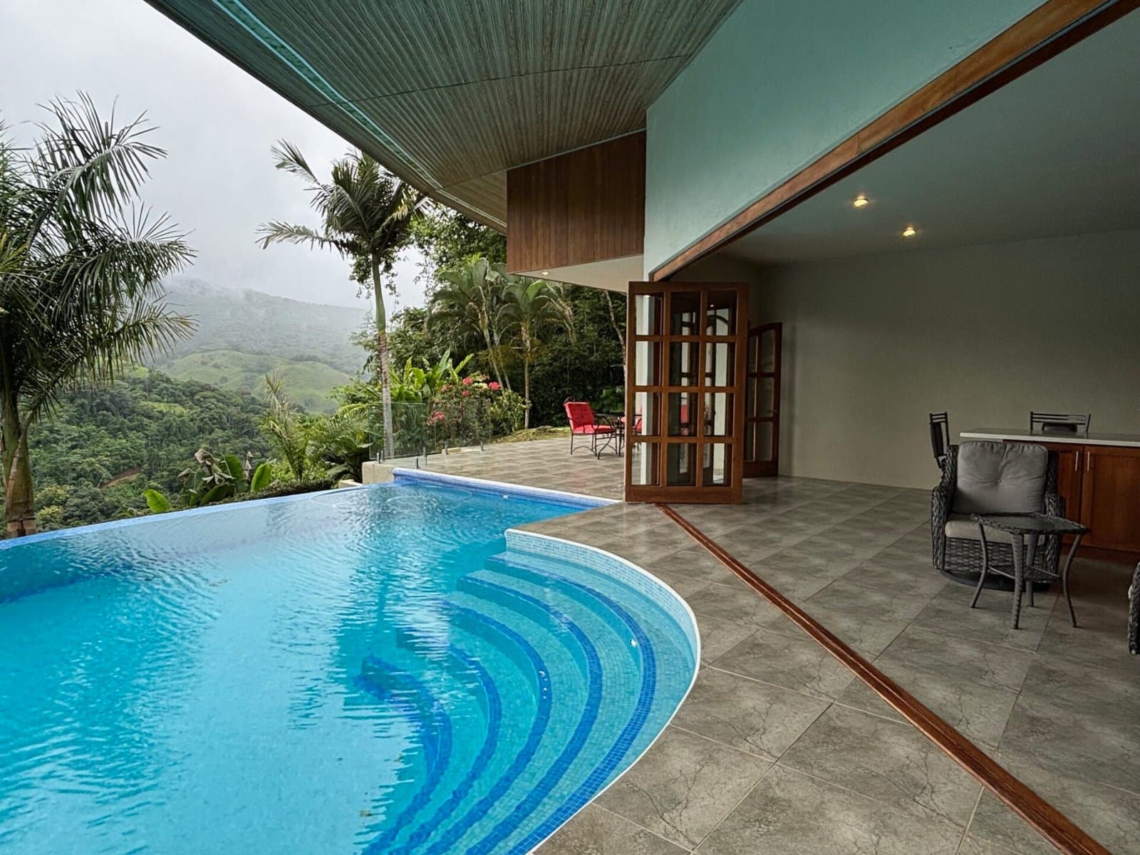 15.18 ACRES 3 Bedroom Riverside Sanctuary Home With Majestic Mountain View Pool Surrounded By Abundant Fruit Trees And Wildlife! property photo 2 in Costa Rica