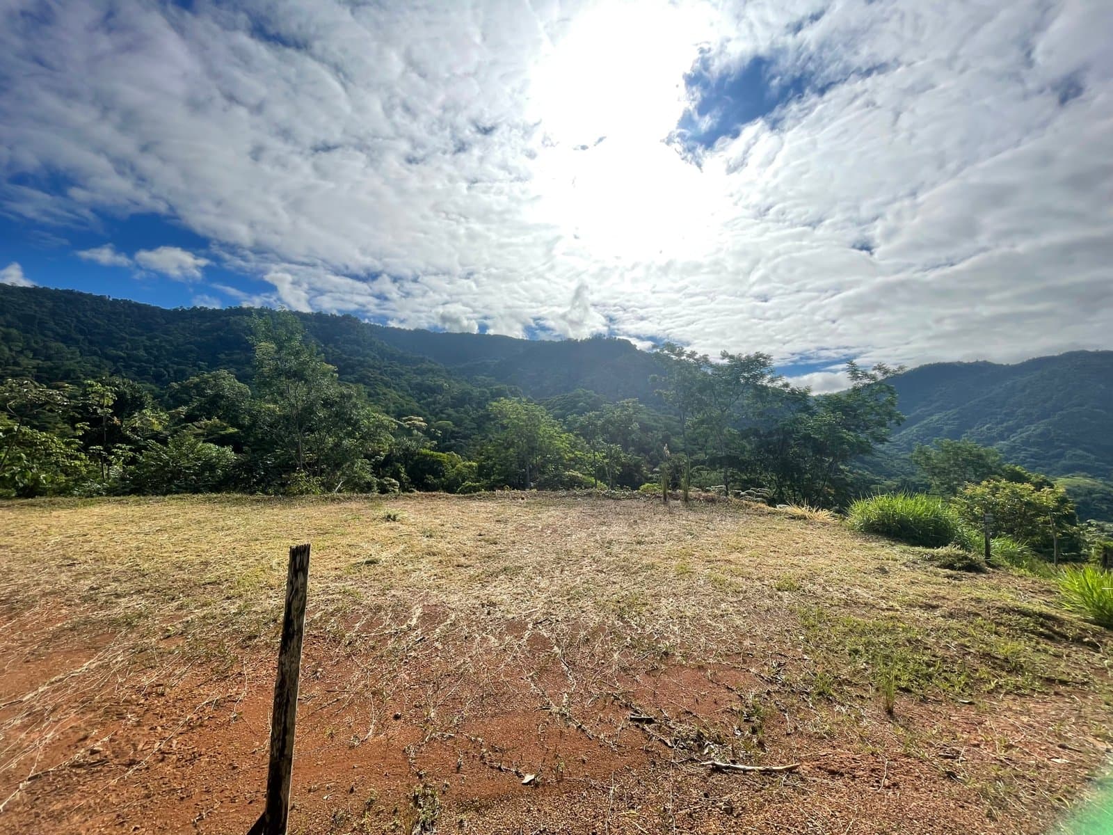 2.47 ACRES Mountain And Ocean View Land With Two Ready To Build Plantels, Commercial And Residential Potential, And Space To Grow Your Own Food!