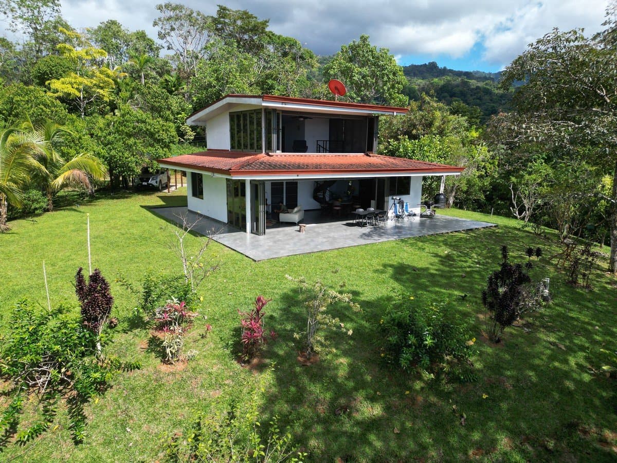 3.13 ACRES – 2 Bedroom Riverfront Home, Fruit Tress, Mountain Views & Partial Ocean View photo 2