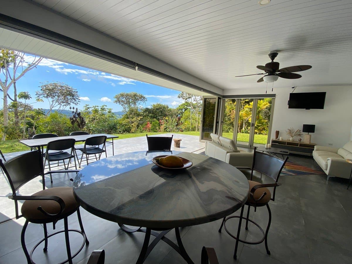 3.13 ACRES – 2 Bedroom Riverfront Home, Fruit Tress, Mountain Views & Partial Ocean View photo 3