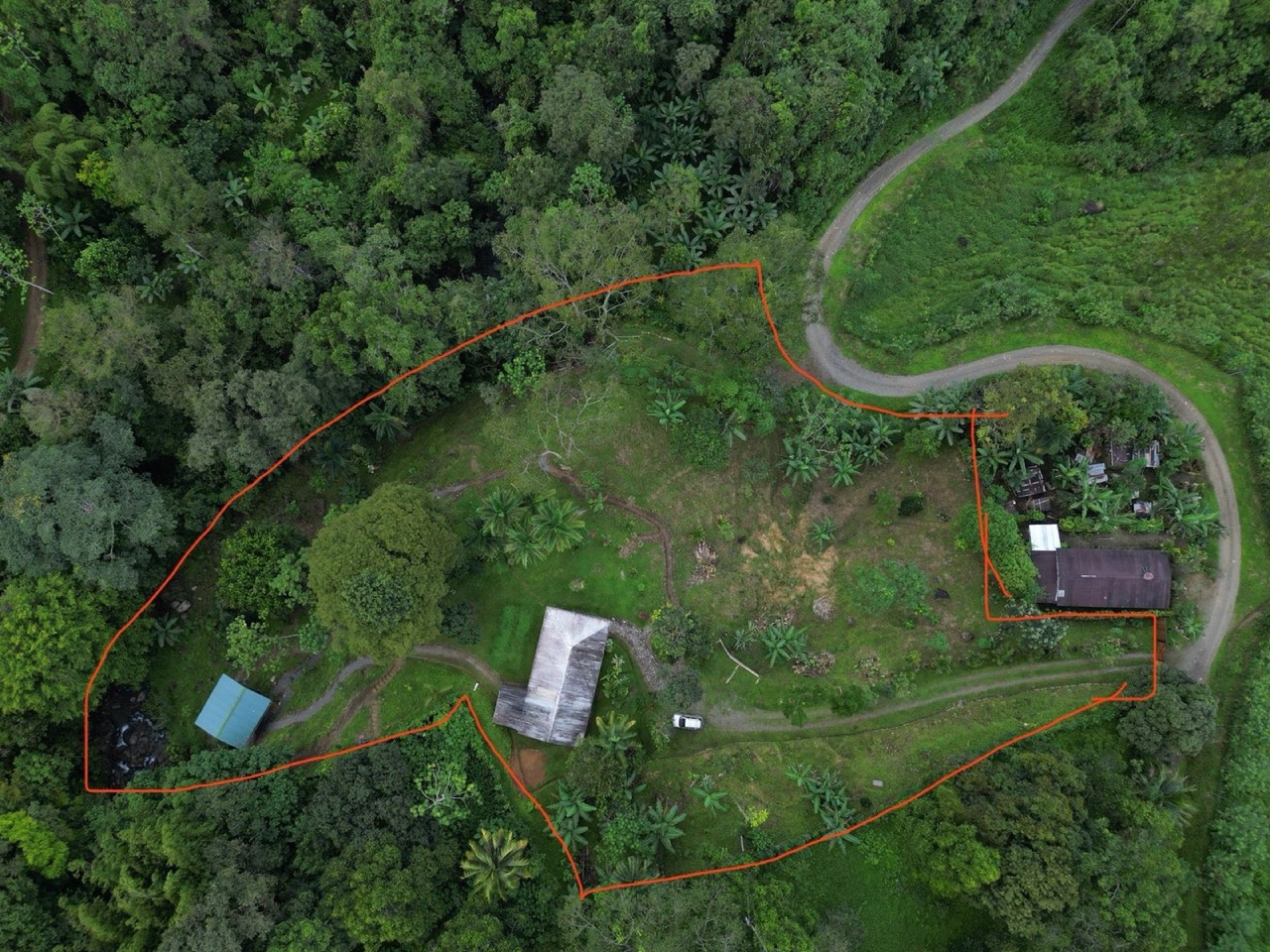 1.65 ACRES 3 Bedroom Tico Style House Plus 1-Bedroom Cabin by the River W Large Garden, Mountain Views And Room To Build More! property photo 2 in Costa Rica