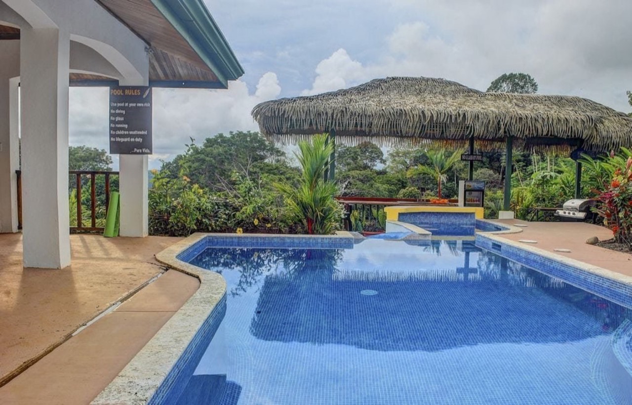 2.7 ACRES – 3 Bedroom Home With Great Mountain View, 2 Pools With Waterslide, 2 Wheel Drive Access! property photo 4 in Costa Rica