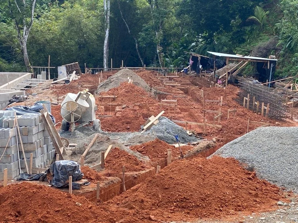 Digging and Pouring Footers - Casa Cavu